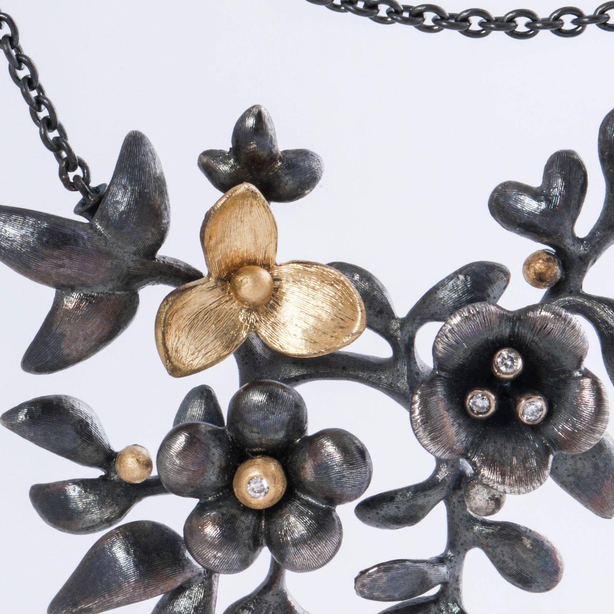 A moonstone and brilliant cut diamond necklace by Ole Lynggaard.