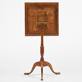 A burr-alder tilt-top table by J. Sjölin (master 1767-85).