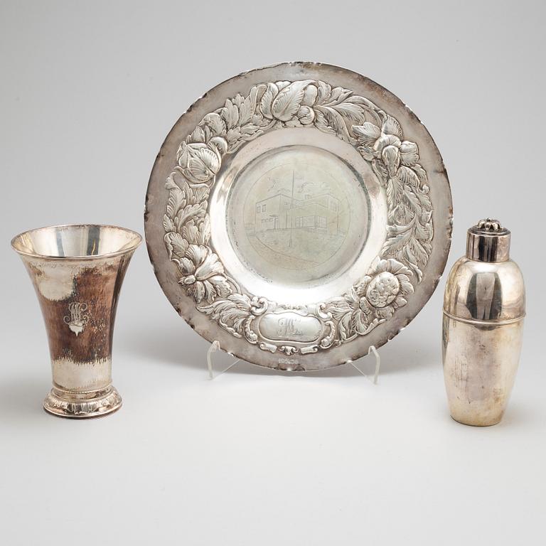 A cocktailshaker, a cup and a dish, silver, 1930-40s.