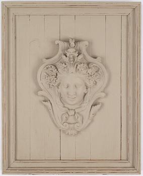 Wall relief, 20th Century, painted plaster & wood.
