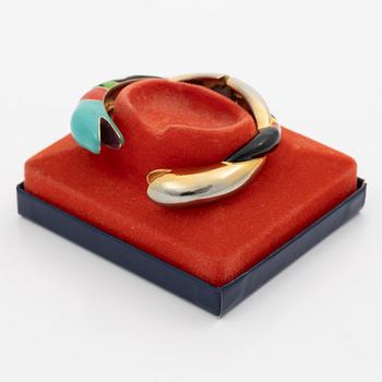 Niki de Saint Phalle , armband, "serpentine bracelet" guldfärgad metall med emalj.