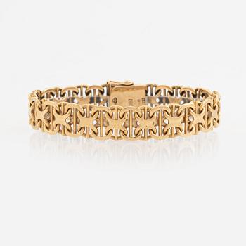 18K gold bracelet.