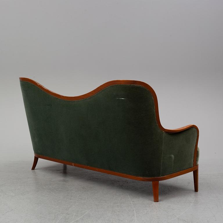 CARL MALMSTEN, an 'Advokaten' mahogany sofa.