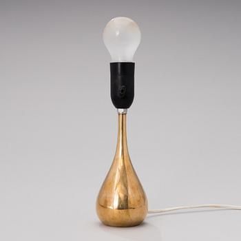 A table light manufactured by Idman from the mid 20th century.