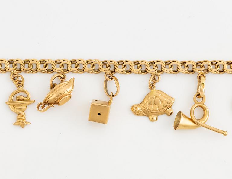 Bracelet, with charms, 18K gold.