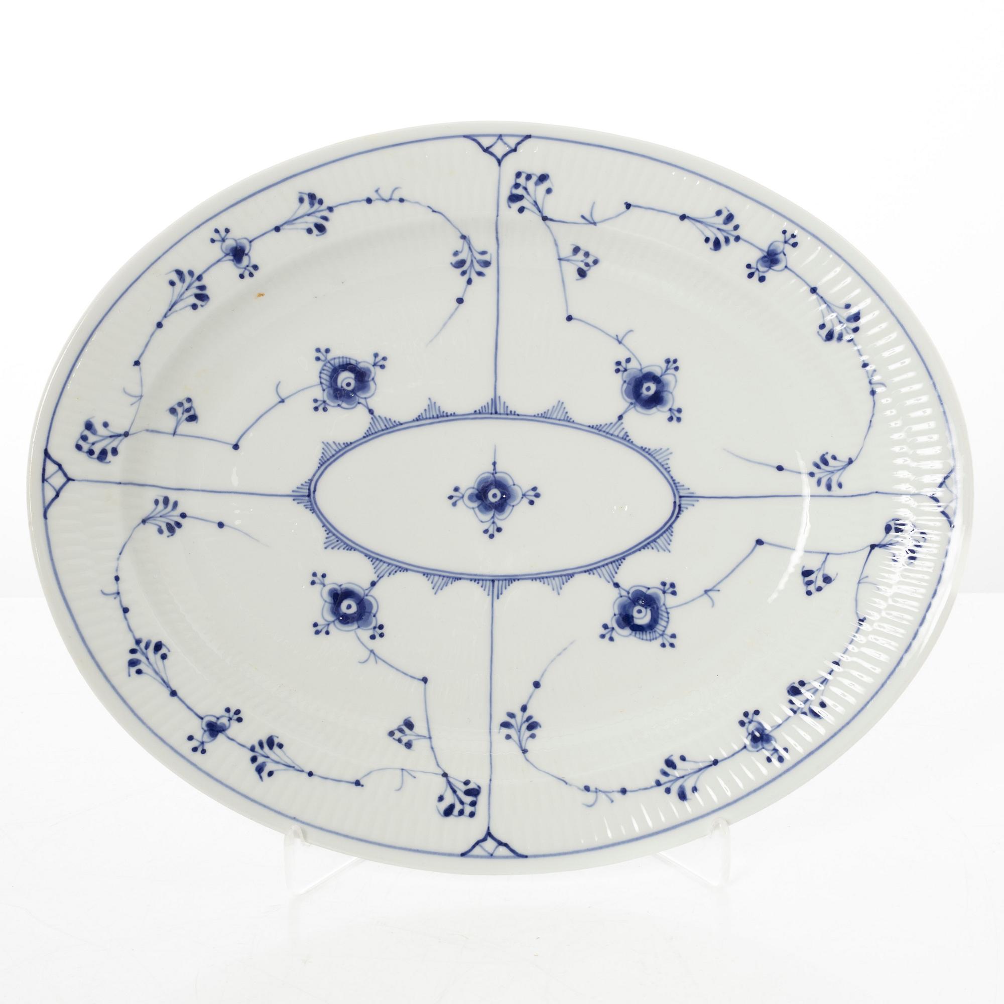 Royal Copenhagen, 35 pieces of a porcelain 'Blue Fluted' half lace dinner service, Denmark, 1889-1978.