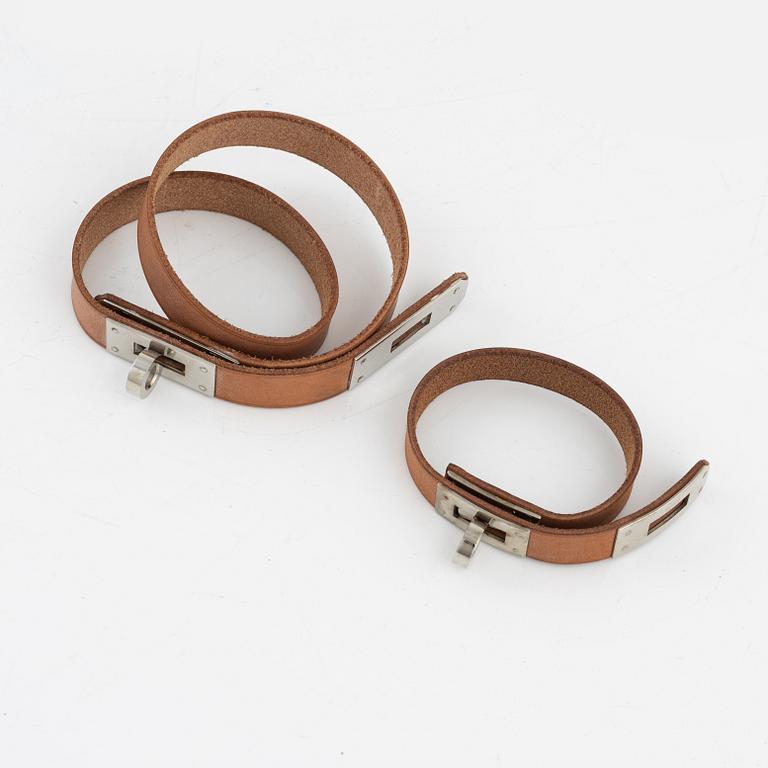 Hermès, two leather 'Kelly' bracelets.