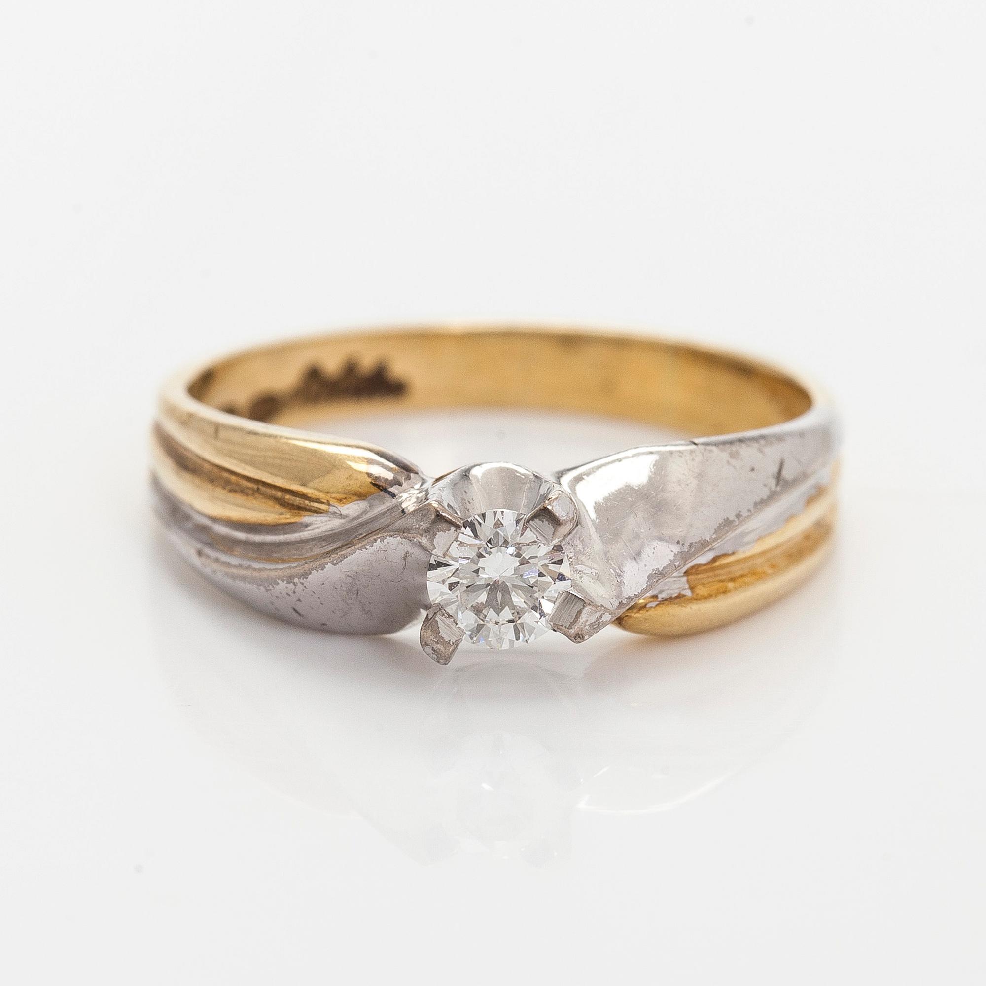 Ring, briljantslipad diamant 14K guld och vitguld, Silván, Helsingfors 1997.