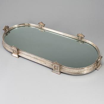 An Austrian-Hungarian early 20th century silver table-mirror. Empire-style.
