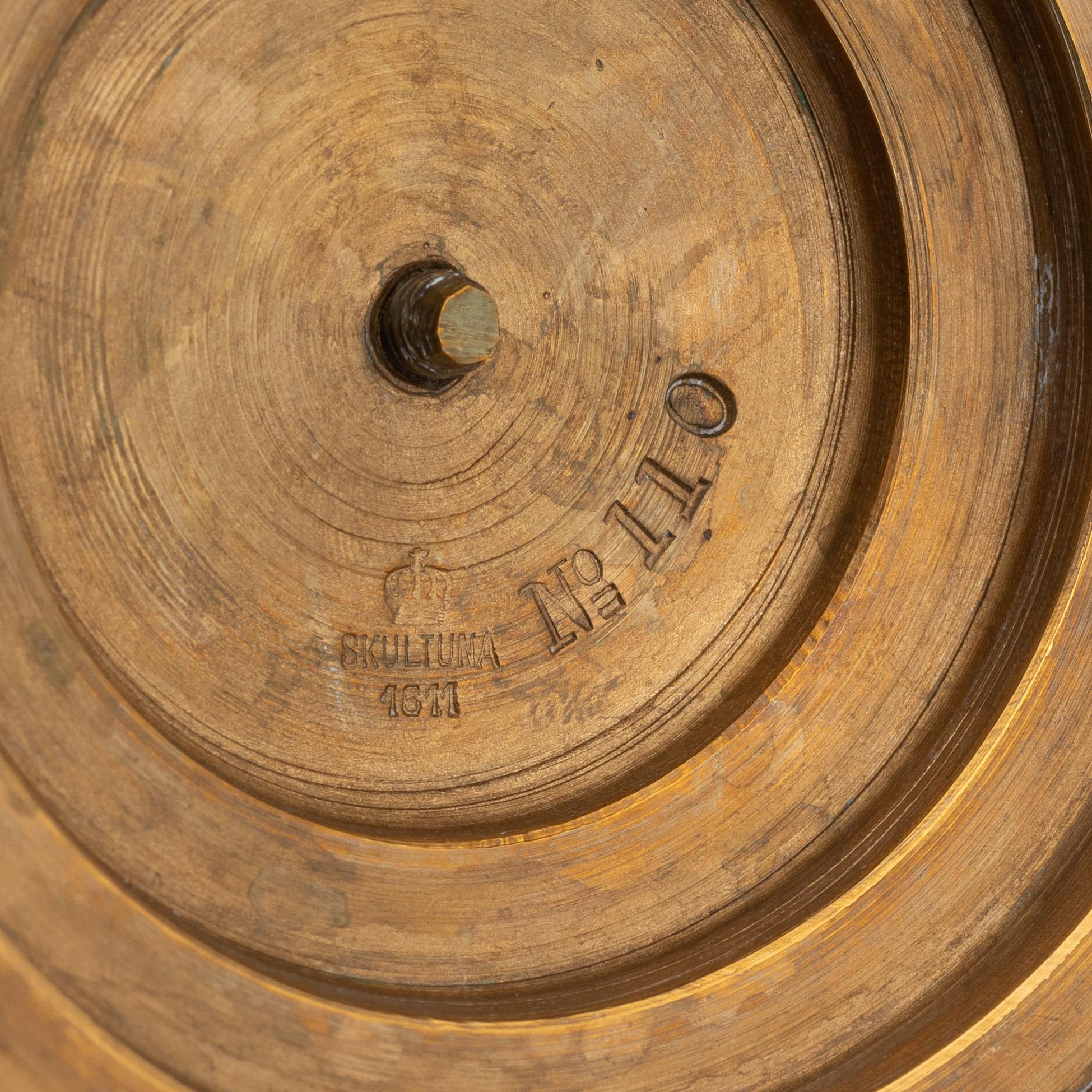 A pair of brass cassolettes from Skultuna Bruk.
