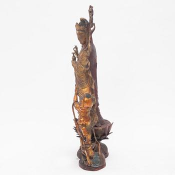 A large gilt and lacquer sculpture group, three parts, 20th century.