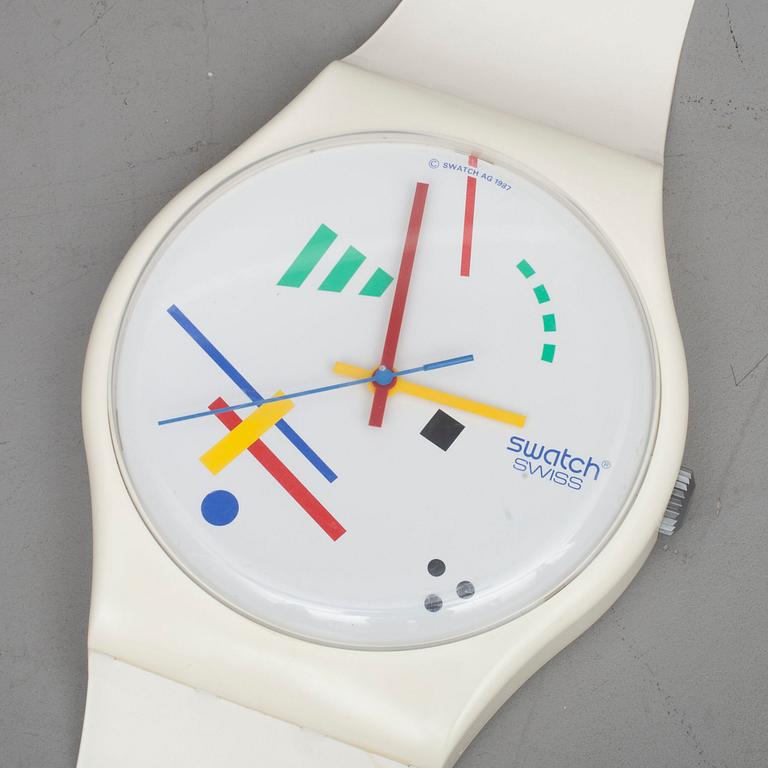 SWATCH VÄGGKLOCKA.