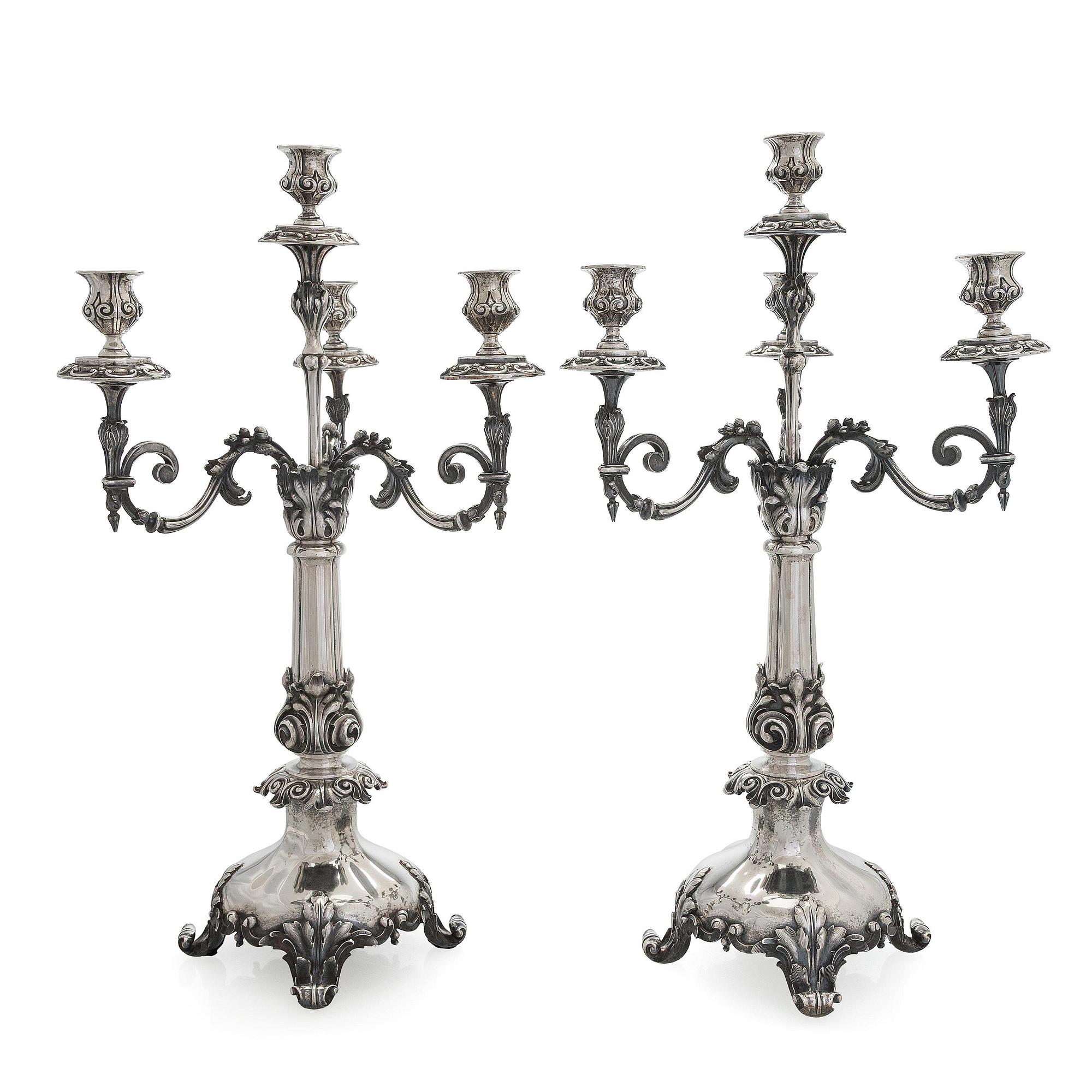 A pair of silver candelabra, maker marks of Carl Johan Tegelsten, Saint Petersburg 1850.