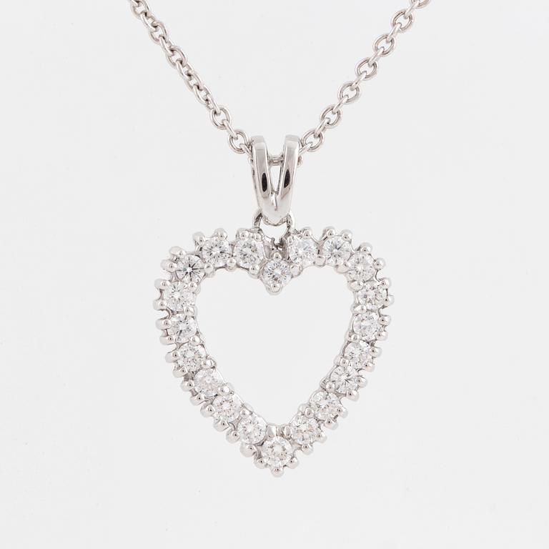 A brilliant cut heart shaped diamond pendant.