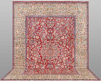 A carpet Yazd, c. 394 x 299 cm.