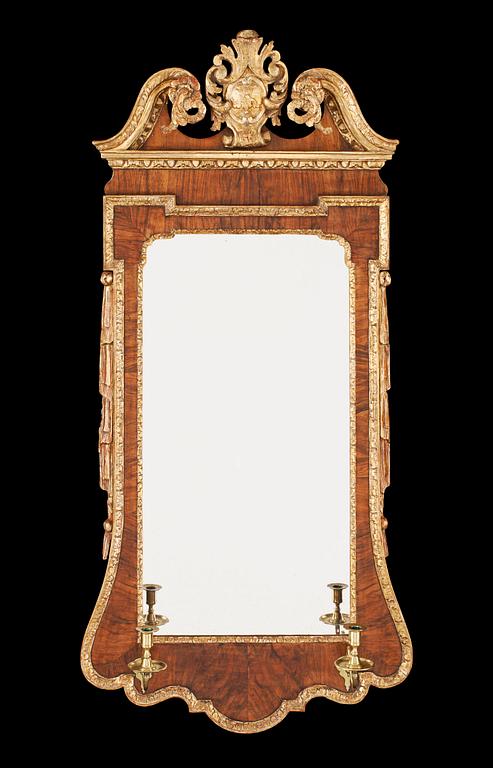 An English late Baroque 18th century two-light girandole mirror.