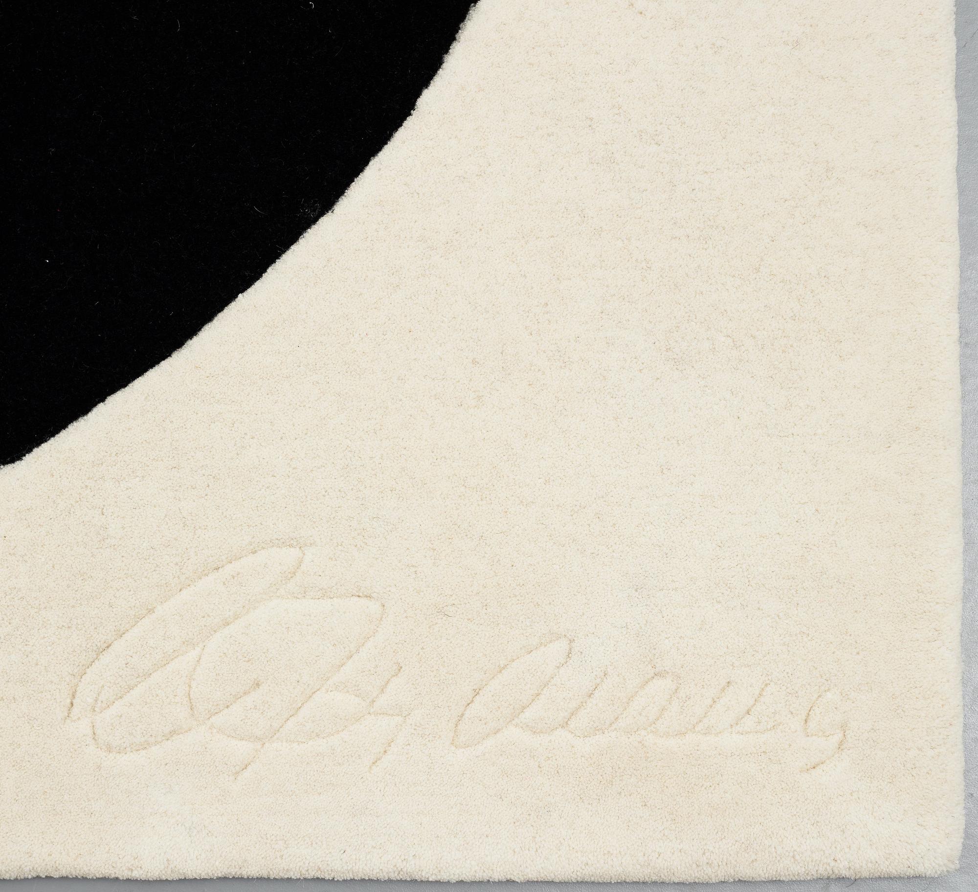 Robert Indiana, A CARPET, "White on Black", Chosen Love, hand tufted in 1995, ca 302 x 305 cm, Robert Indiana.