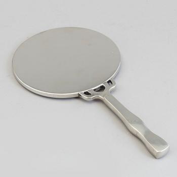 A Svenskt Tenn pewter mirror.