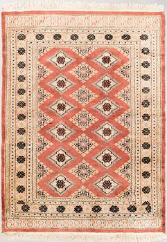 A rug from Karachi. Ca. 176x128 cm.