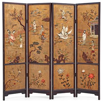 A four panel wooden and lacquered screen with inlays of stone and bone, late Qing dynasty (1912-1644).