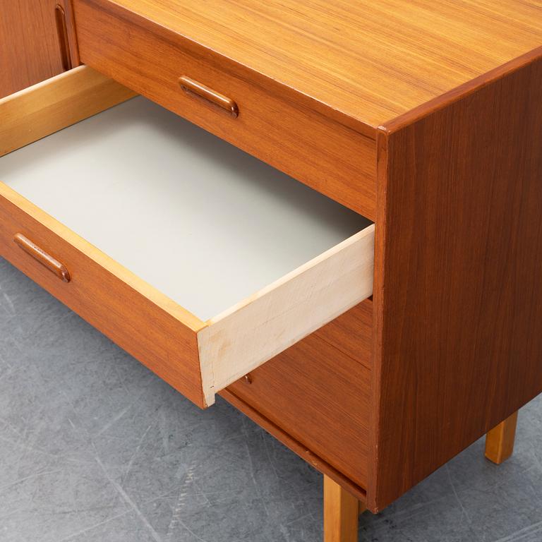 A second half of the 20th century teak veneered sideboard.