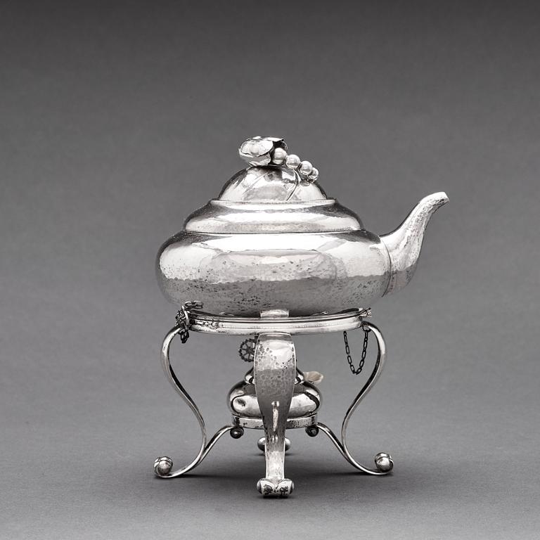 Georg Jensen, a three pieces coffee and tea service, "Blossom", Copenhagen Denmark 1915-21 830/1000 silver. Design nr 2,