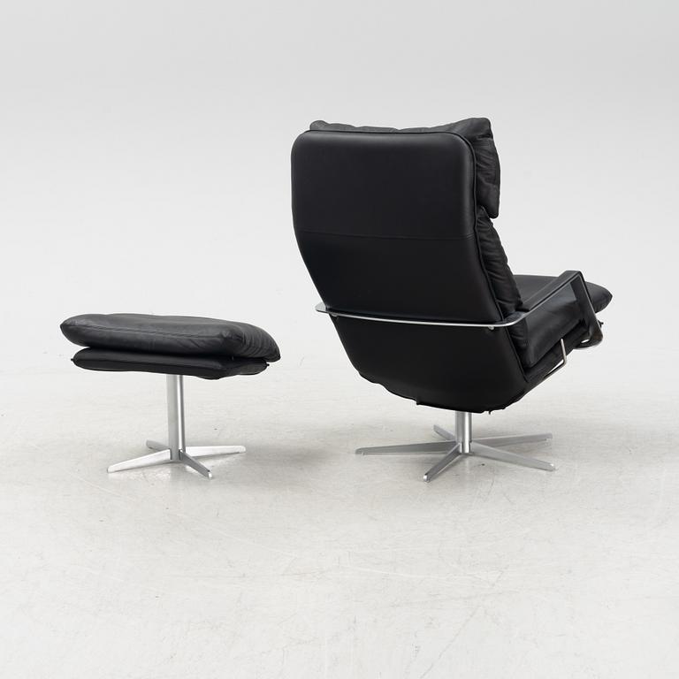 A leather 'SL 330' swivel chair and ottoman, Søren Lund, Denmark.