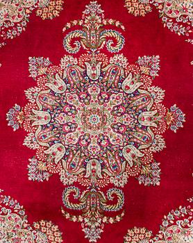 A carpet, Kirman, ca. 333 x 244 cm.