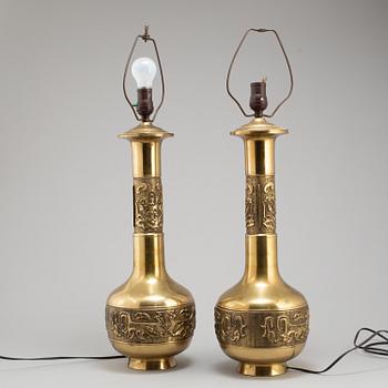 A pair of Chinese brass table lamps, 20th century.