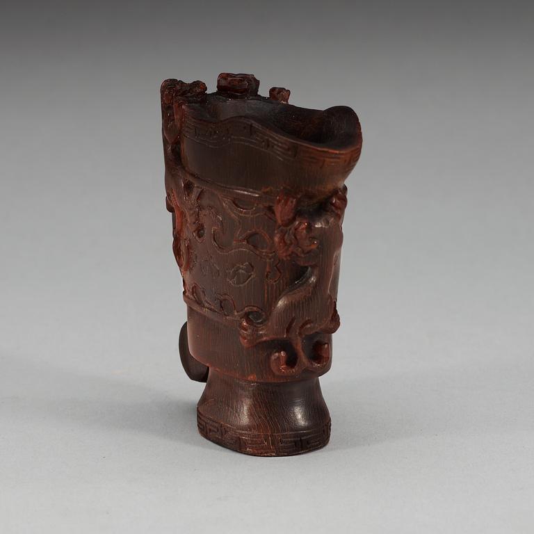 A rhinoserous libation cup, late Qing dynasty.