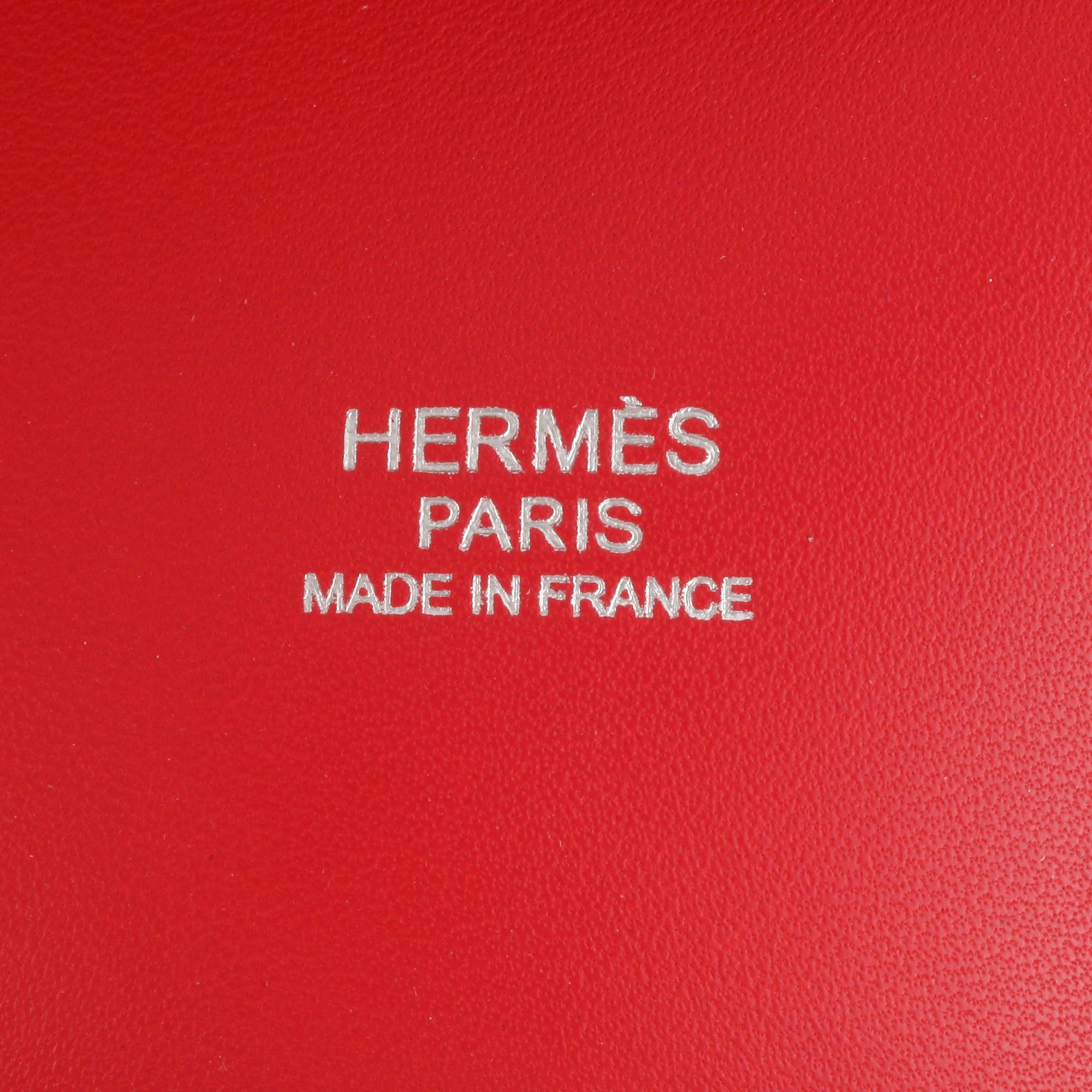 HERMÈS, a pink coral leather bag.