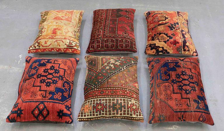 Six Anatolian "carpet cushions", around 60 x 40 cm.