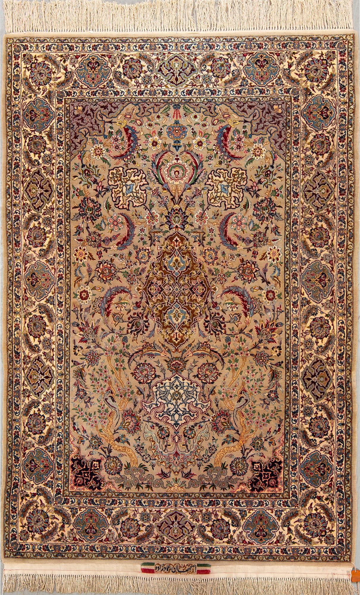 A signed isfahan part silk carpet ca 192 x 118 cm.