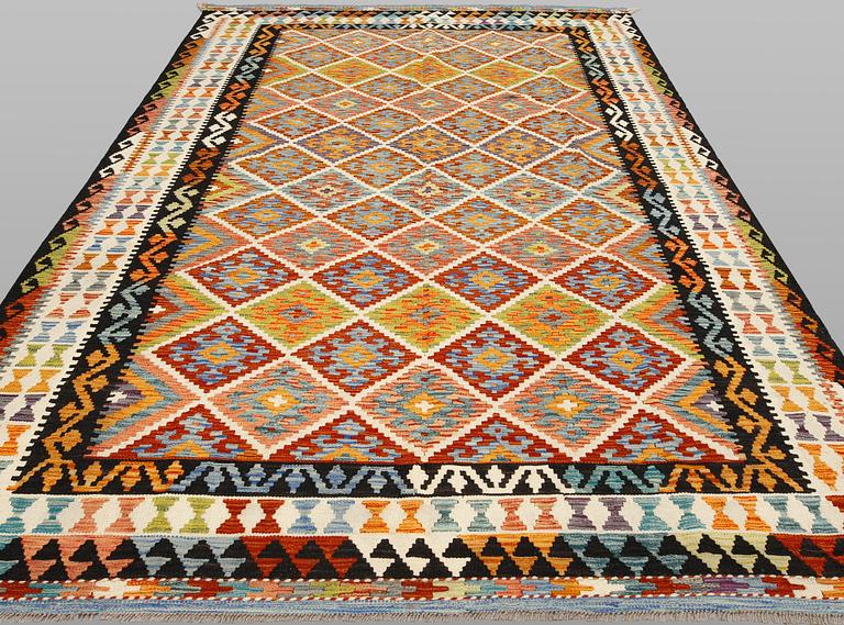 A Kilim carpet, approx. 302 x 203 cm.
