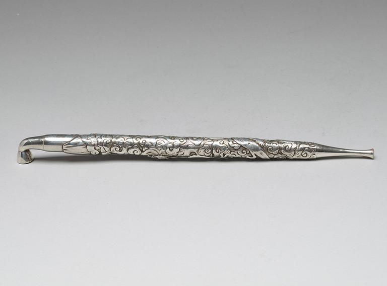 A Japanese silver opium pipe, Meiji period (1868-1912).