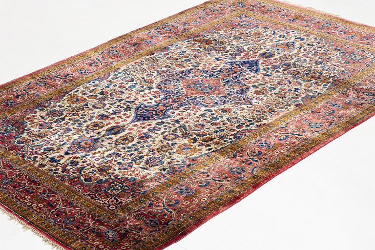 A rug, antique, silk Kashan, ca 208 x 131,5-136 cm.