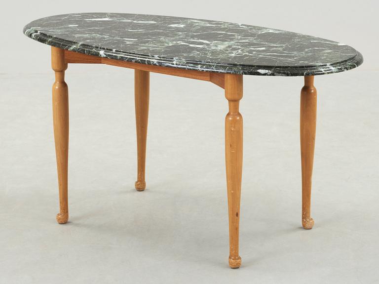 A Josef Frank marble and mahogany table, Svenskt Tenn.