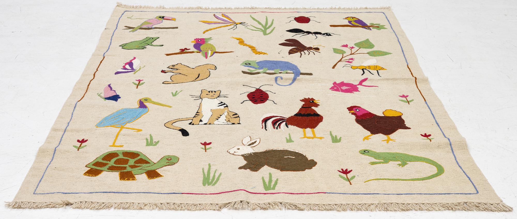 A hand-embroidered Kelim carpet, 202 x 150 cm.