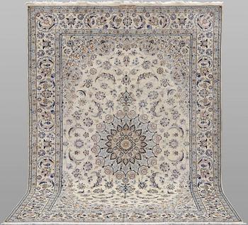 A part silk Nain carpet, signed, so-called 9LAA, approx. 307 x 205 cm.