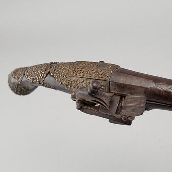 A mid 19th century miquelet lock pistol.