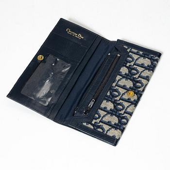 Christian Dior, a wallet.