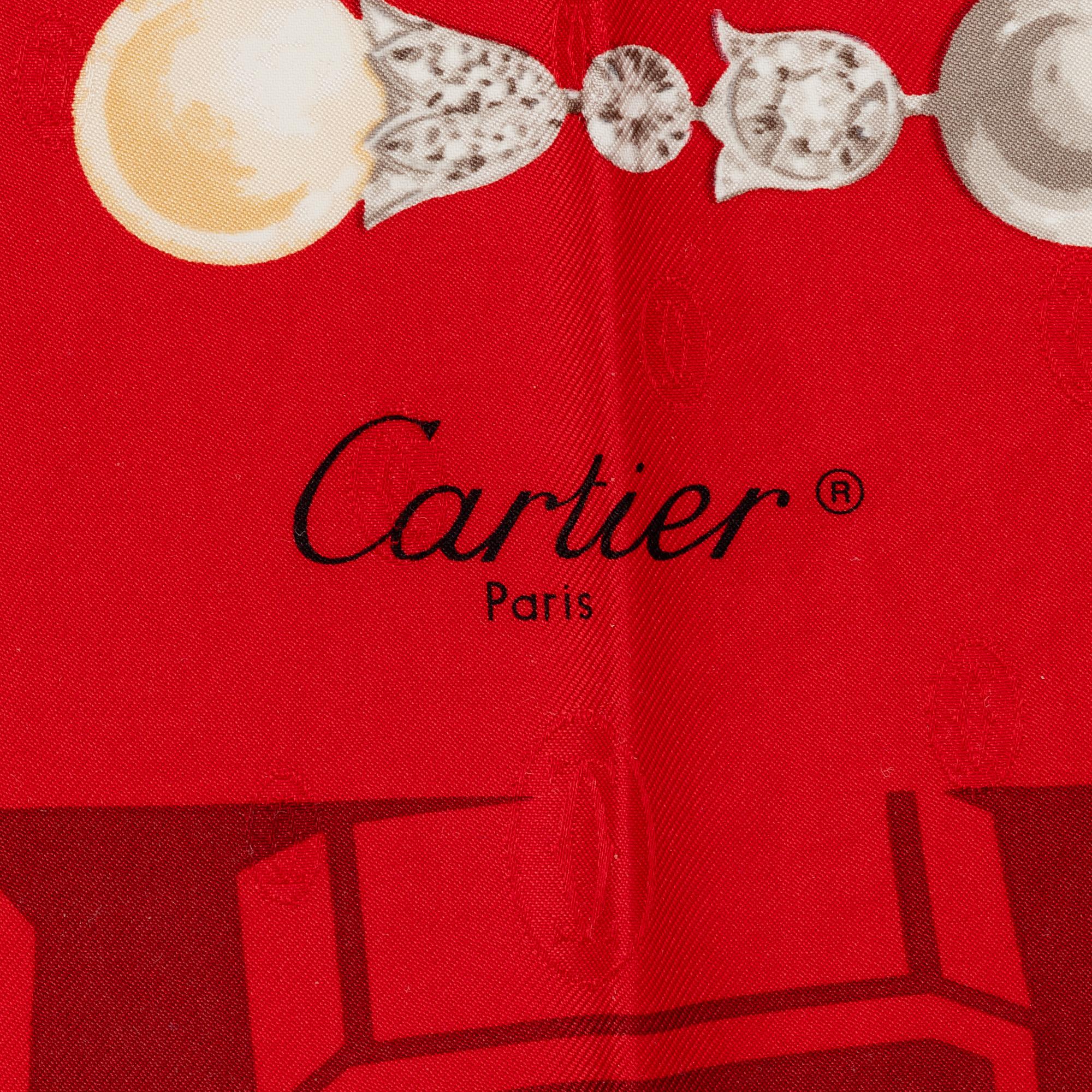 Cartier, a jacquard silk scarf.