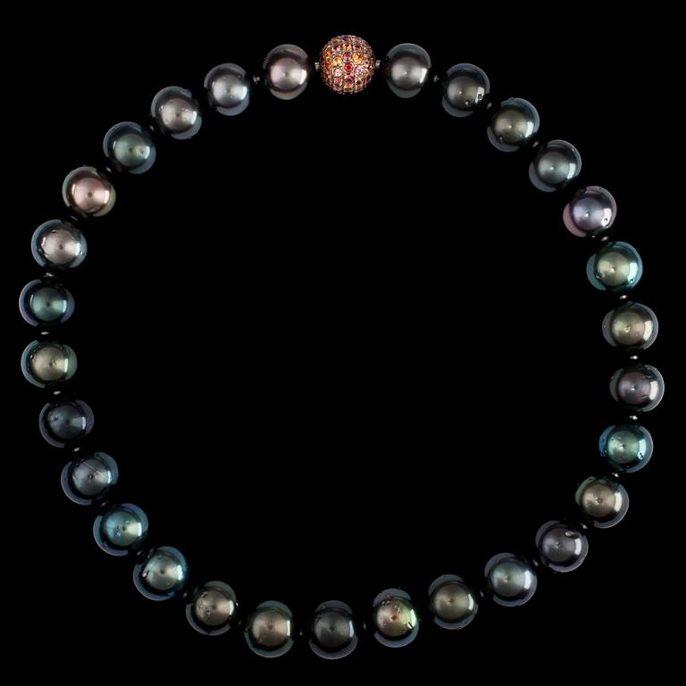 A cultured Tahiti pearl necklace, 15-13.4 mm, clasp set with orange-red sapphires.