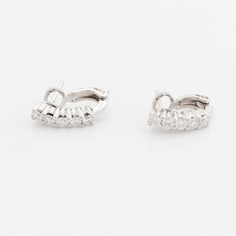 Brilliant-cut diamond earrings.