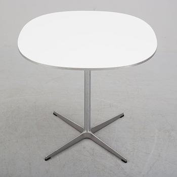 A 'Supercirkel' table by Bruno Mathsson & Piet Hein, Denmark, 1978.