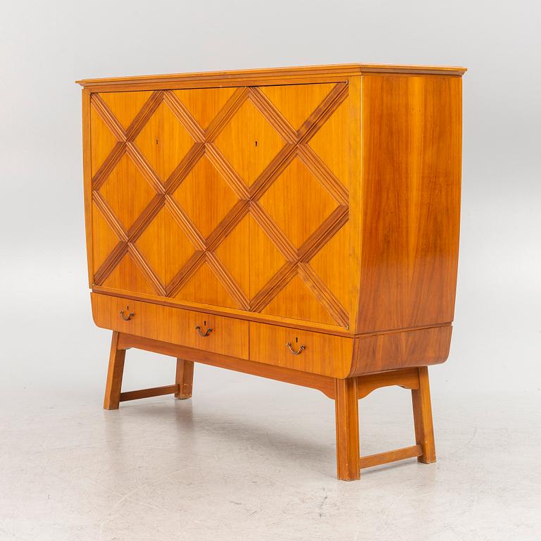 A Swedish Modern cabinet, 1940s/50s.