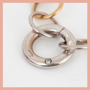 ARMBAND, 18K flerfärgat guld, Pomellato "Lucciole", samt briljantslipad diamant tot ca 0,03 ct. Total vikt ca 20,80 g.