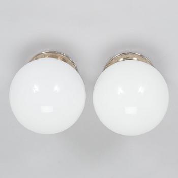 A pair of 1930s ceiling lights.