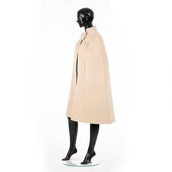 SALVATORE FERRAGAMO, a beige wool cape.