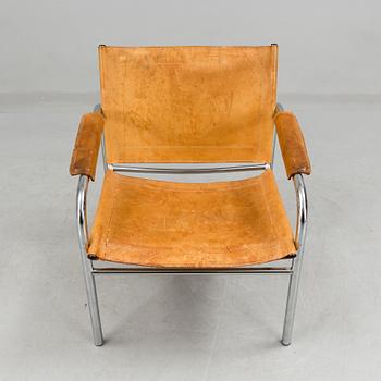 a leather and metal armchair, probably by IKEA.